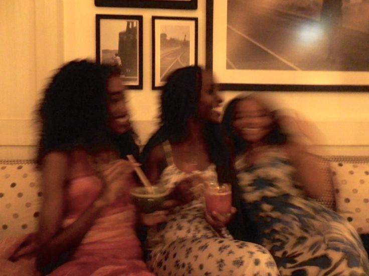 Three women sharing a joyful moment together